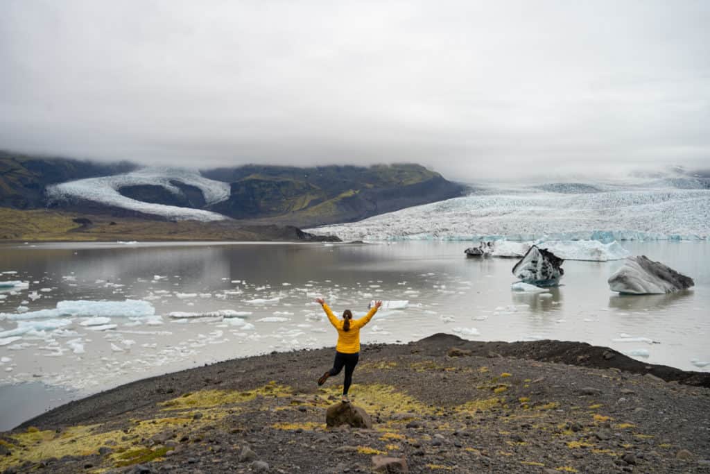 Amanda at Fjallsárlón with two glaciers